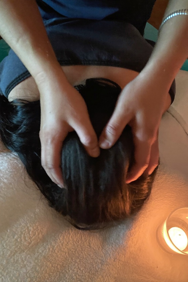 A scalp massage during a treatment